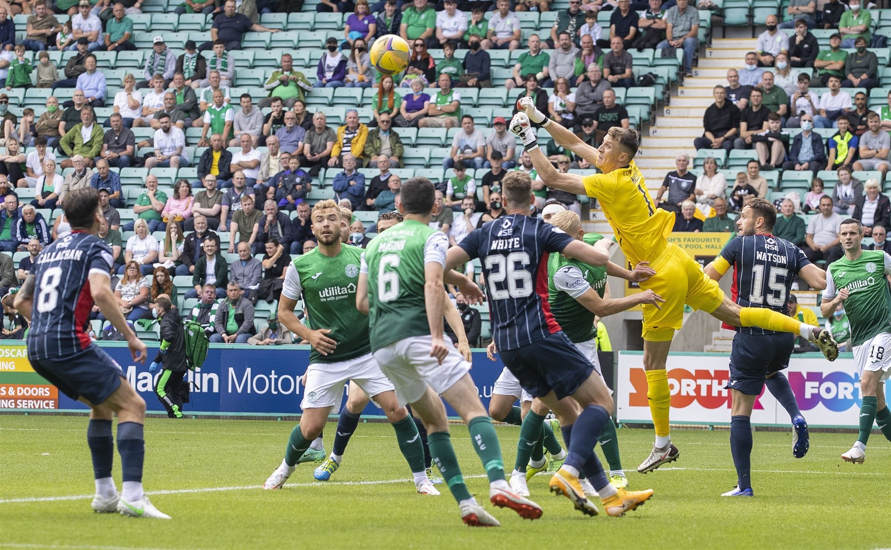 Picture - Ken Macpherson, Inverness. Hibs(3) v Ross County(0). 08.08.21. Hibs 'keeper Matt Macey punches clear from a County attack in the first 5 minutes.