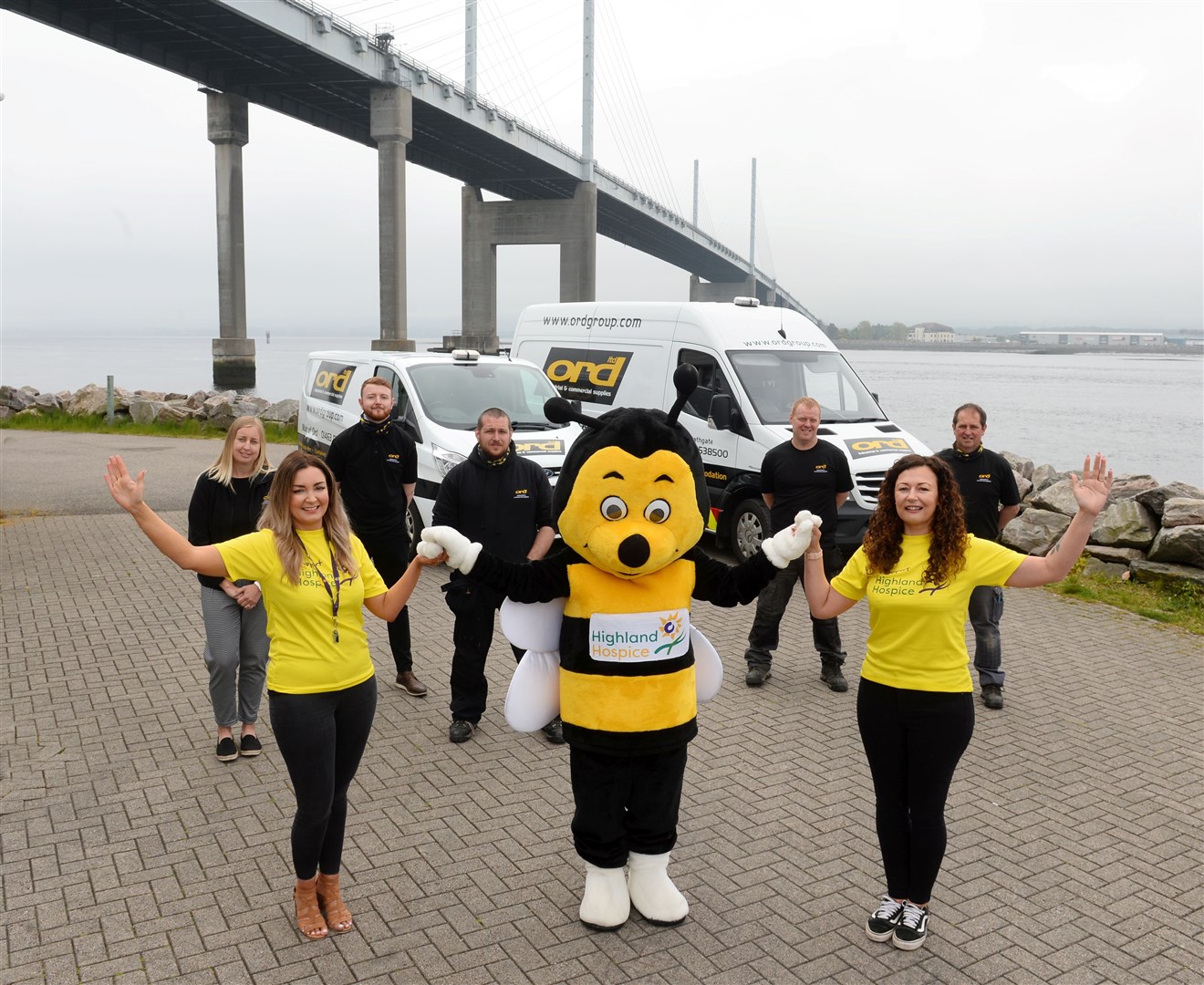 Highland Hospice is looking for heroes for a 100ft abseil from Kessock Bridge. Bobby the Bee welcomes Emma Nicol, left, and Kerry MacDonald with Team Ord (sponsors ORD Industrial and Commercial Supplies Ltd) who have signed up for the abseil. Picture: Gary Anthony
