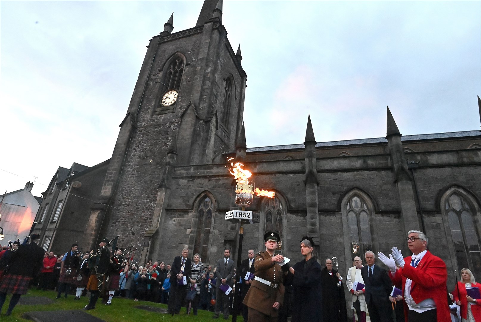 A Platinum Jubilee beacon is lit at St Macartin’s Cathedral Enniskillen (PA)