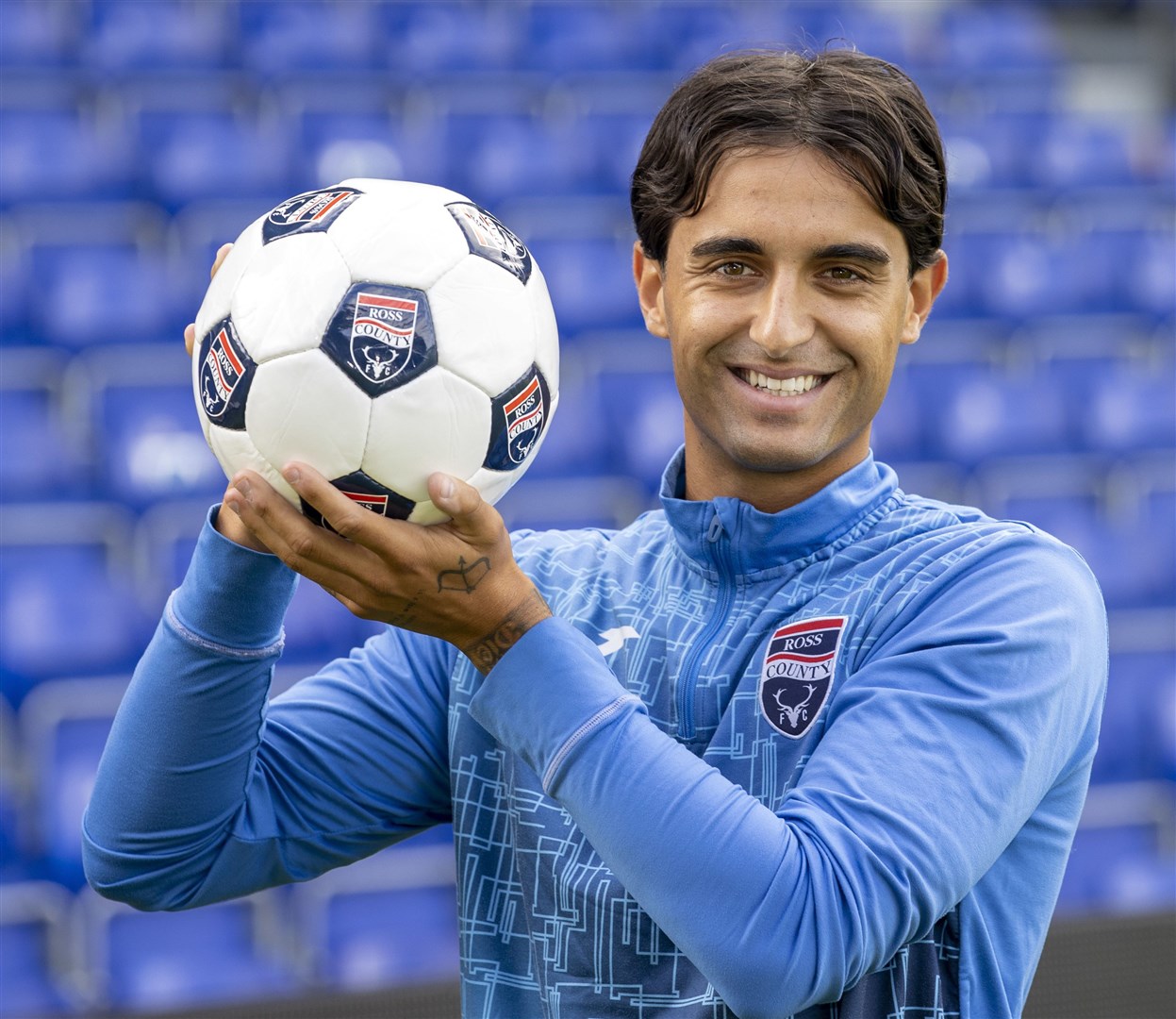 Picture - Ken Macpherson. See story. Ross County new signing Yan Dhanda, pictured on his arrival in Dingwall yesterday (Tues).