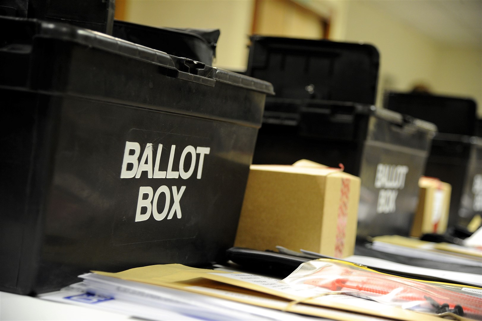 People can vote either in person, by proxy or by mail.