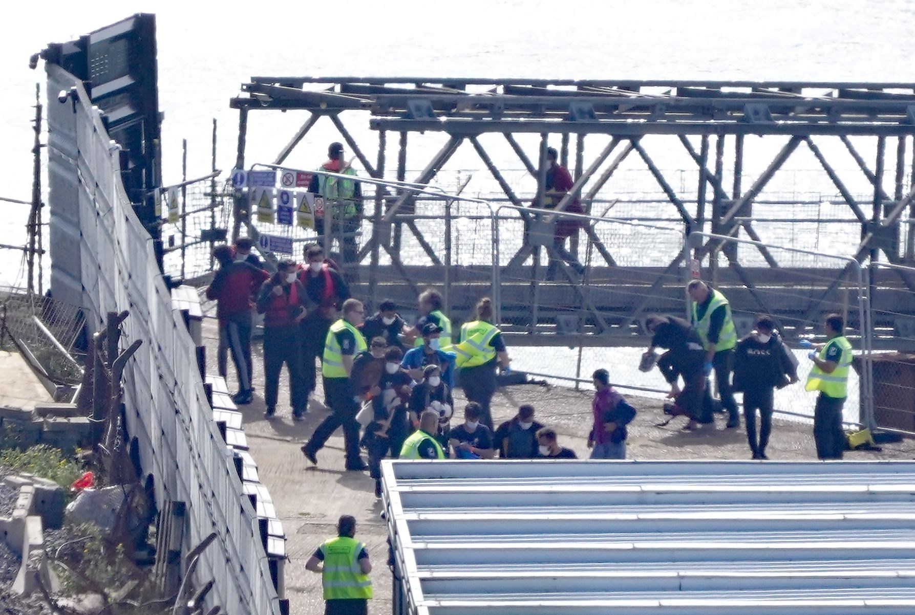 A group of people thought to be migrants are brought in to Dover on Monday (Gareth Fuller/PA)