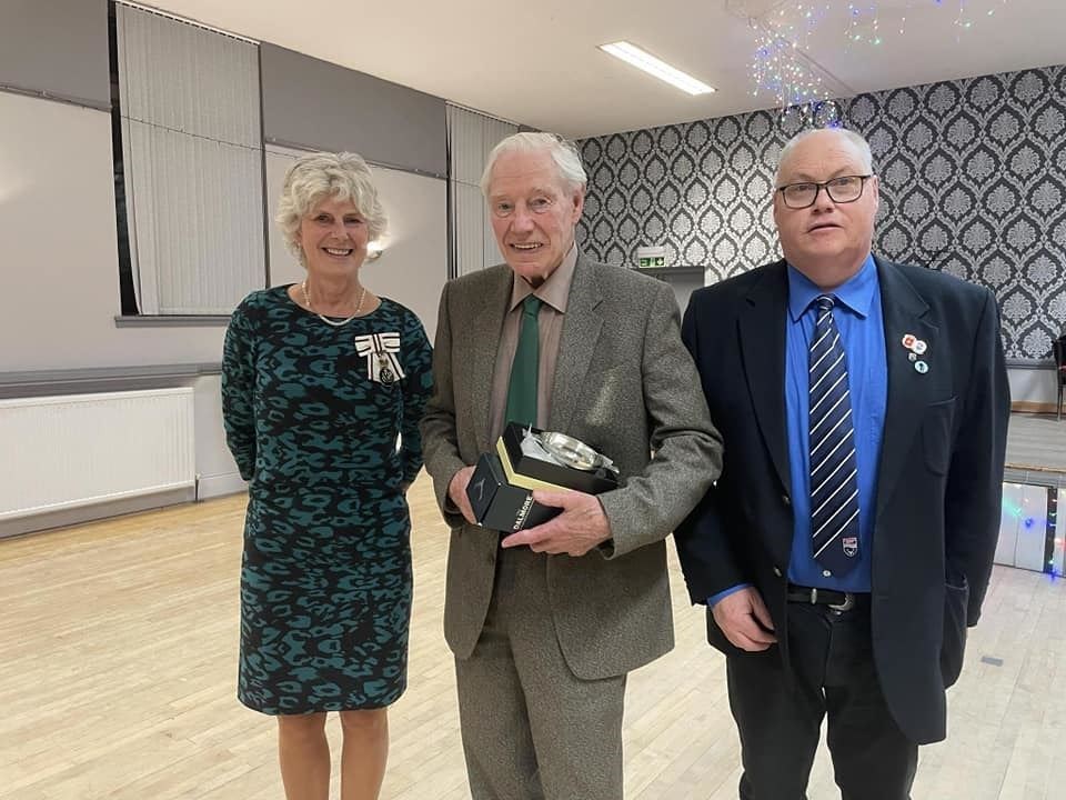 Donald Armstrong was thanked by Andrew Macivor and Ross-shire Lord Lieutenant Joanie Whiteford for his stint as treasurer of the Dingwall Fire Brigade Club. He was presented with a bottle of 15 year Dalmore whisky and an inscribed quaich. Picture courtesy of Dingwall Fire Brigade and Community Group.