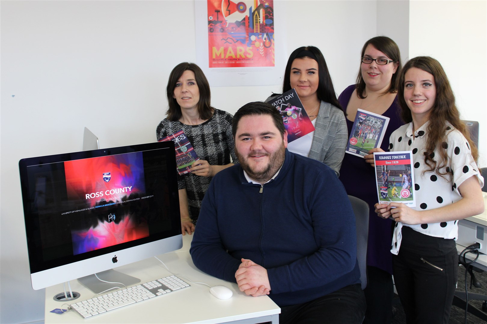 Dale Pryde-MacDonald with some of the HND Visual Communication students.