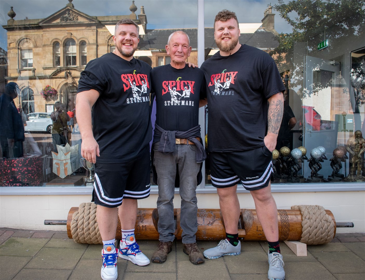 Luke and Tom Stoltman with dad Ben Stoltman, who they have both hailed as a role model. Picture: Callum Mackay.