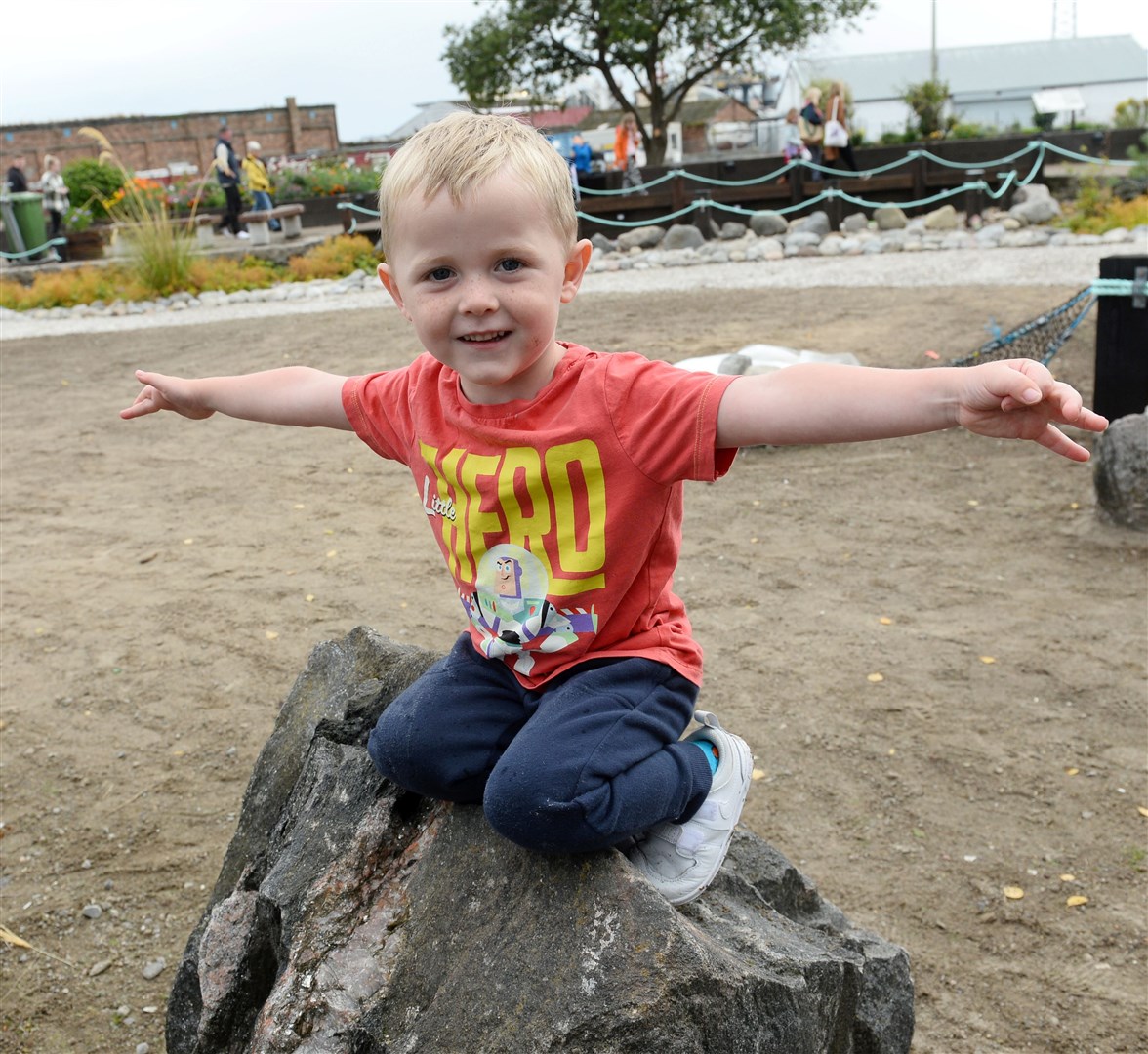 At a Invergordon Development Trust open air market at Natal Garden, Elliot Chisholm climbs the stones. Picture: Gary Anthony