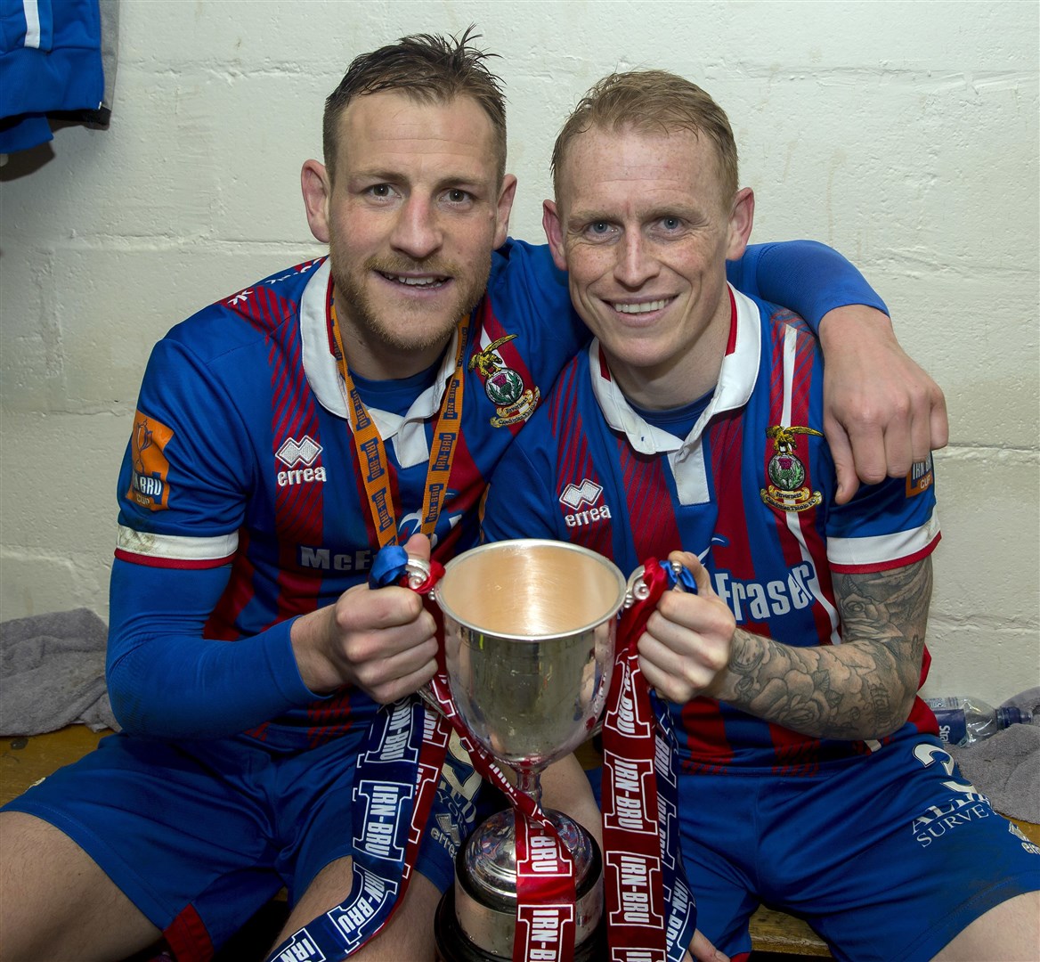 Gary Warren and Carl Tremarco celebrate an Irn Bru Cup win together at past club Caley Thistle