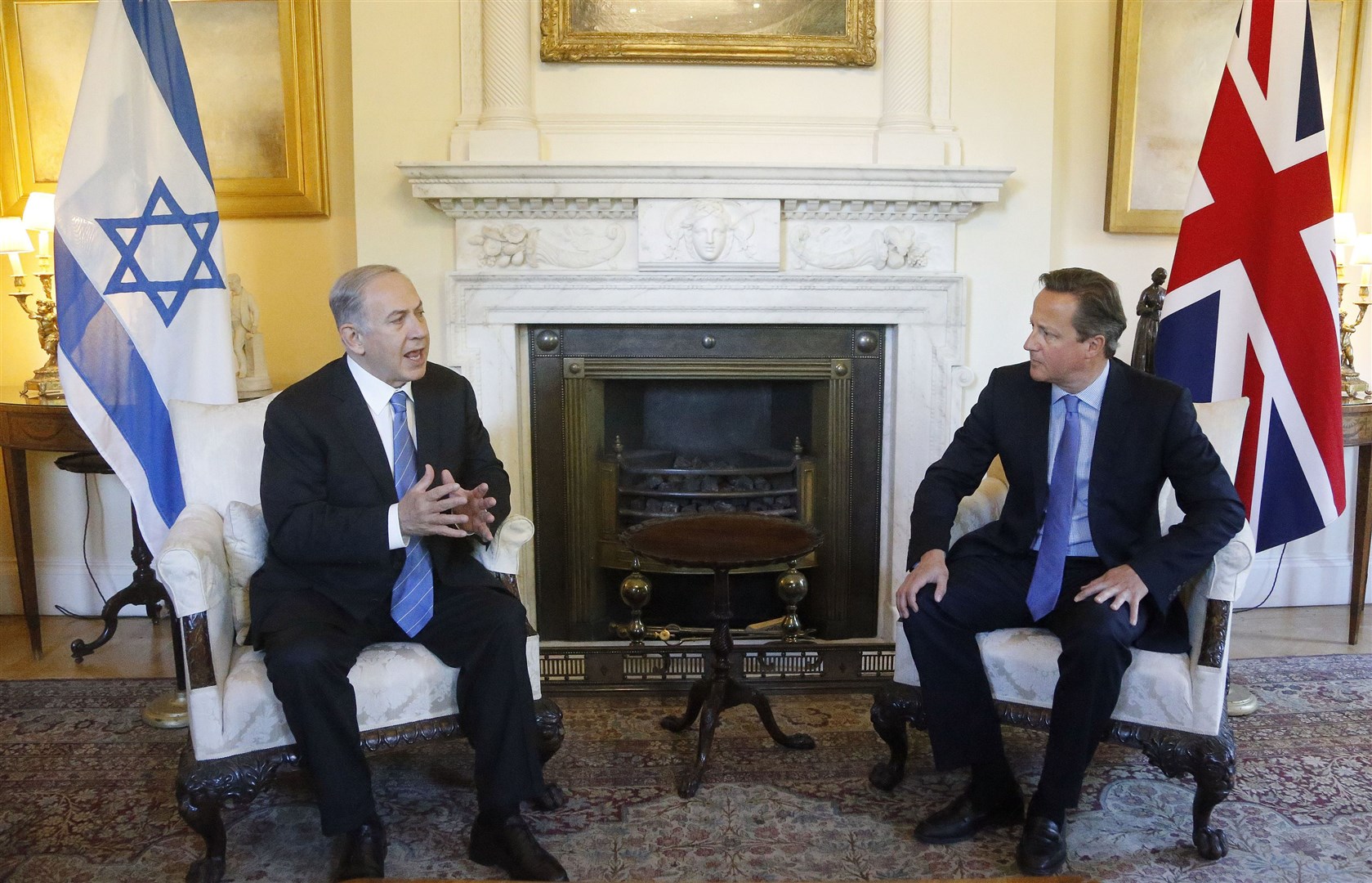 Lord Cameron (right) said Benjamin Netanyahu made a series of commitments in relation to aid (Frank Augstein/PA)