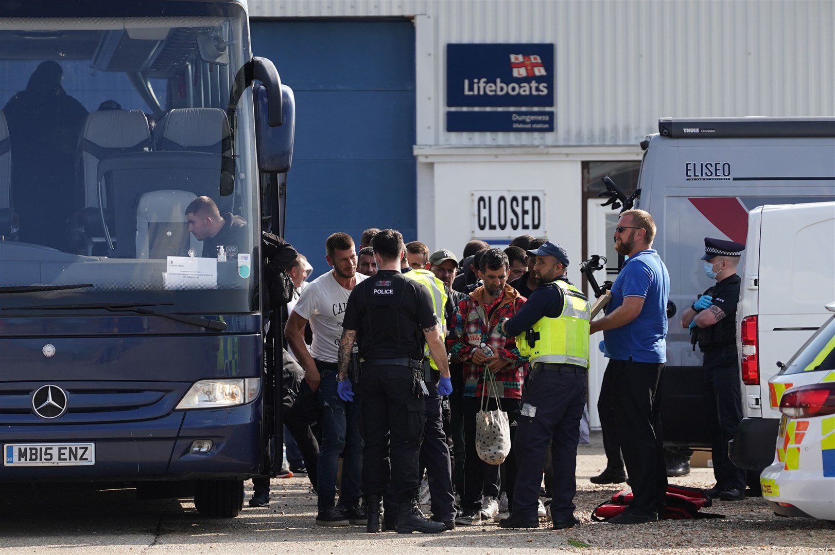 The group was taken by coach to a processing centre (Gareth Fuller/PA)