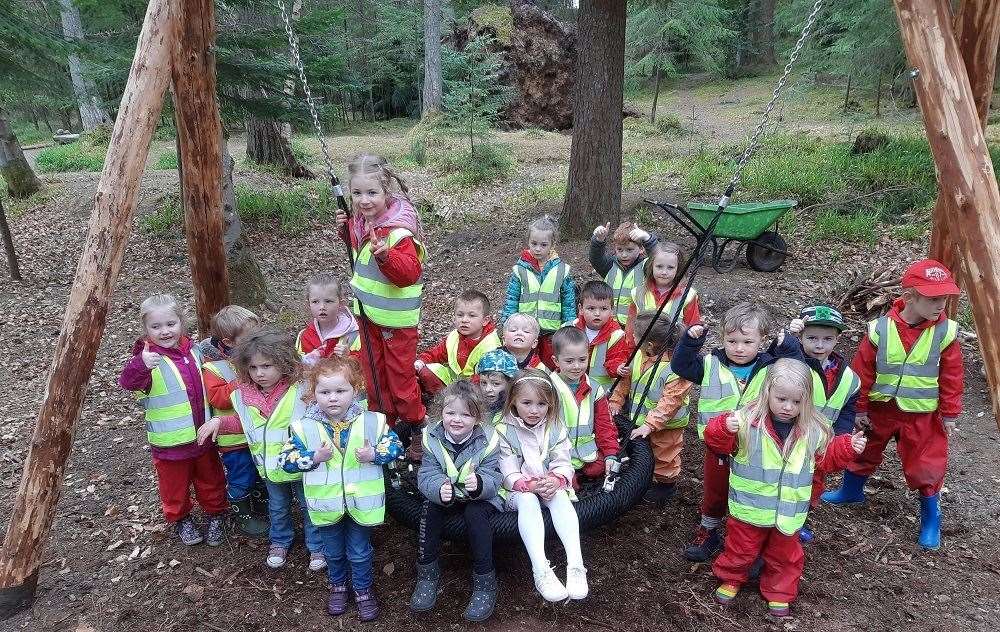 Kiltearn Nursery children give the swing the thumbs-up