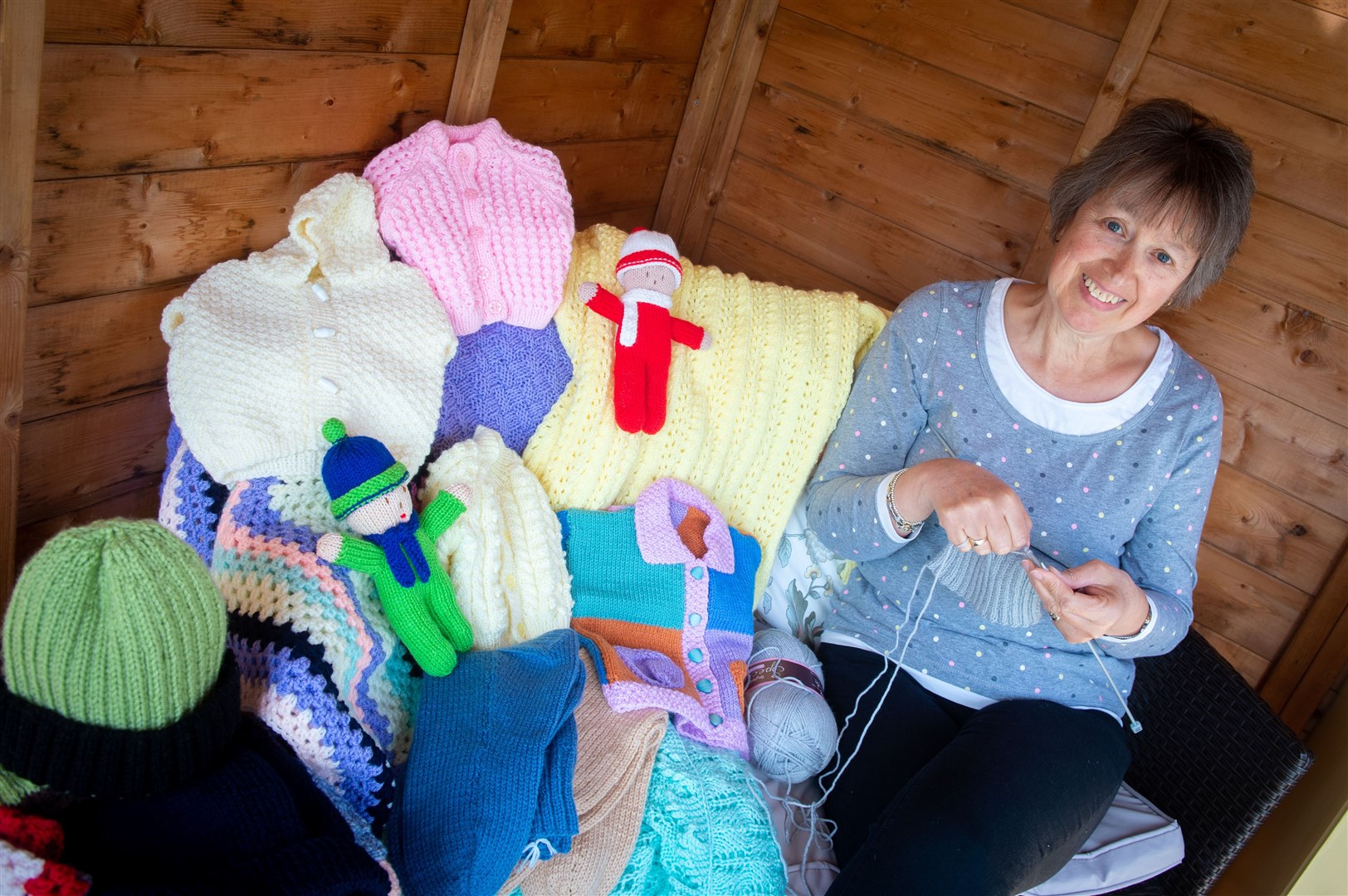 Shona Docherty, president of Highland branch of the Queen Mother's Clothing Guild, making hand-crafted jumpers and socks for those in need. Picture: Callum Mackay