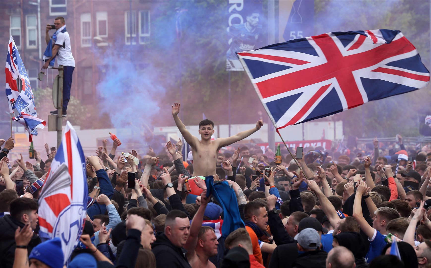 Hundreds of Rangers fans gathered outside Ibrox during the game (Robert Perry/PA)