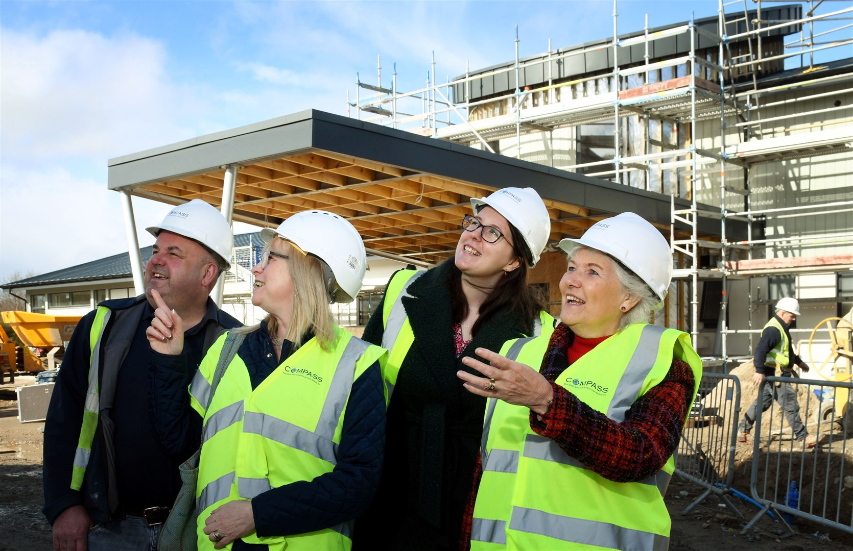 Site manager Greg Cooper, community fundraiser Rona Matheson, Emma Roddick, Scotland's former Equalities Minister, and Elsie Normington, view progress on the Haven Centre.