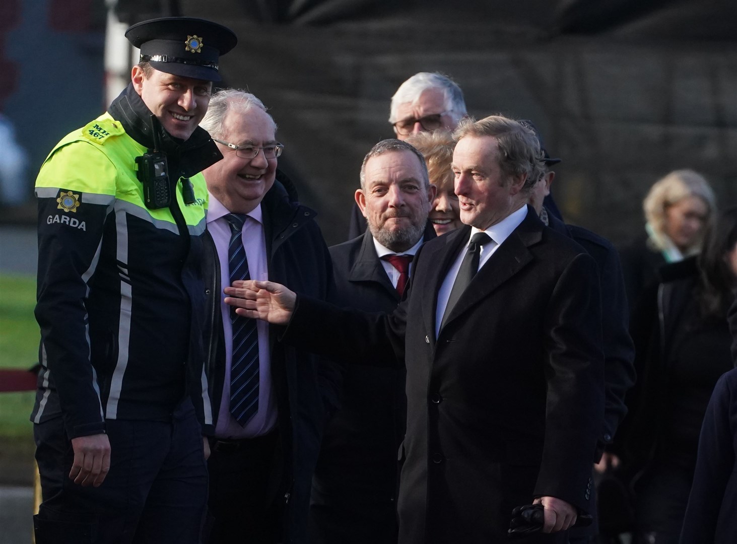 Enda Kenny (right) arrives for the funeral in Dunboyne (Brian Lawless/PA)