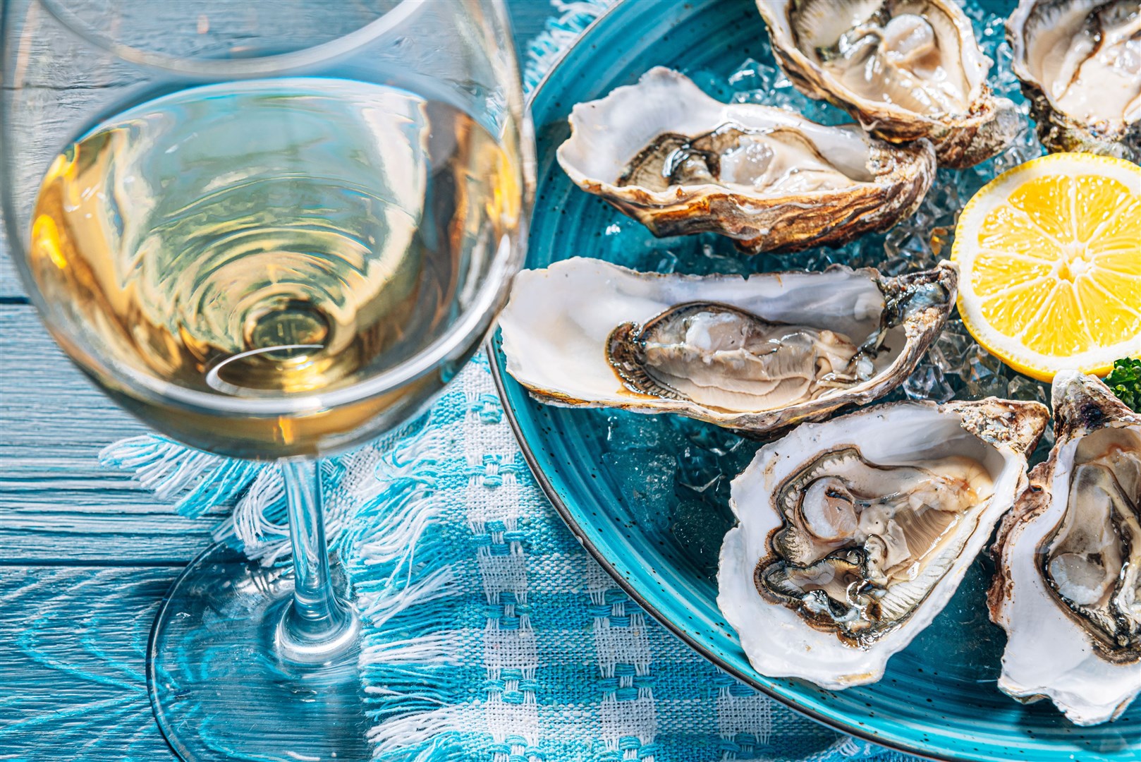 Fresh oysters with lemon ice and white wine. Picture: Stock.