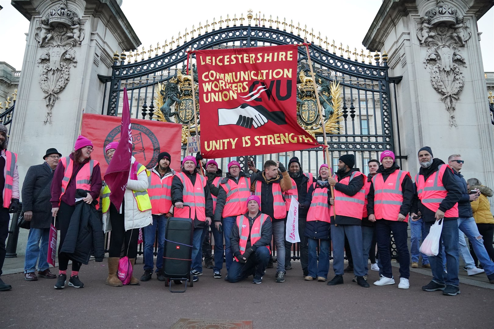 Members of the CWU outside Buckingham Palace (Jonathan Brady/PA)