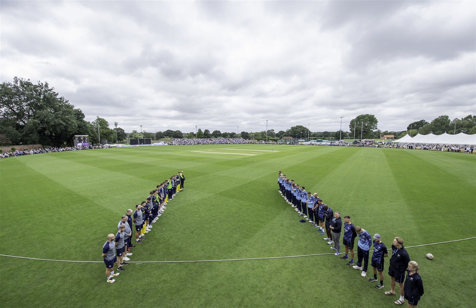 Yorkshire and Hampshire lining up for a minute’s silence to remember Sir Michael Parkinson (Allan McKenzie/SWpix.com/PA)
