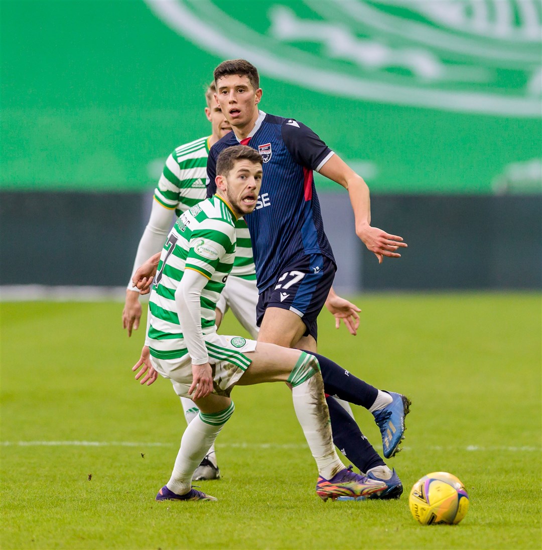 Ross Stewart evades Celtic’s Ryan Christie while at Ross County.