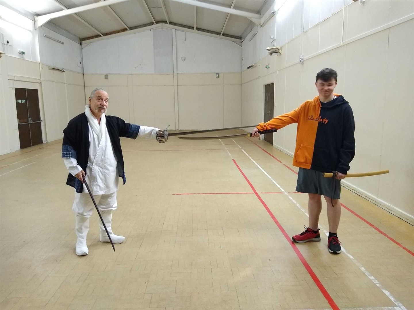 Mick Skelly, left, and one of the participants on the one-day historical fencing course which was held on Dingwall. Photo: Ali Cameron