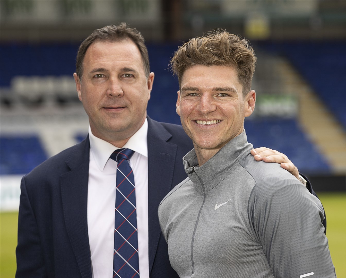New Ross County manager Malky Mackay pictured in Dingwall with his 1st new signing Ross Callachan.
