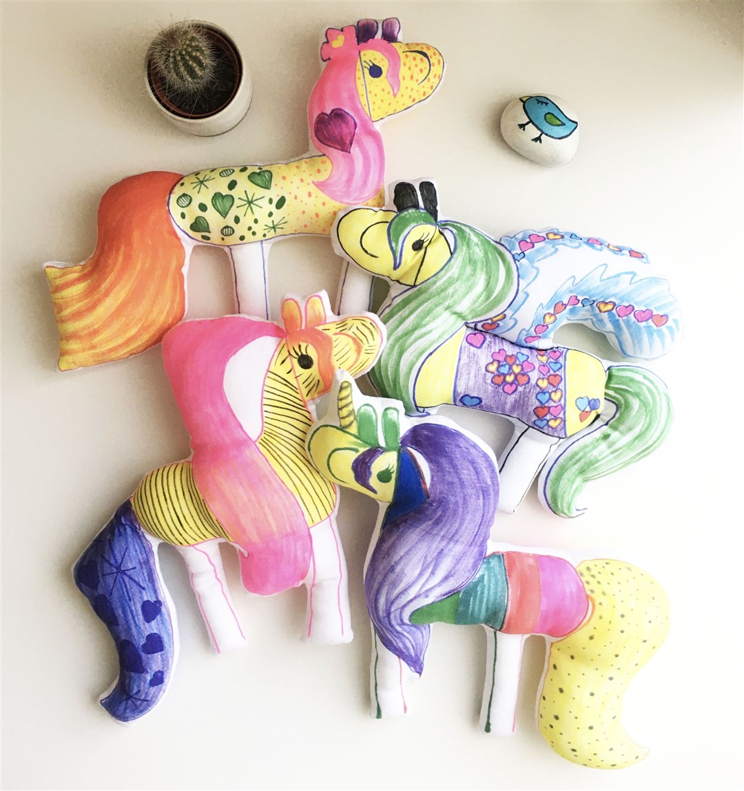 Horse toys created from drawings of horses designed by Lilia (Lilia’s Smiling Horses)
